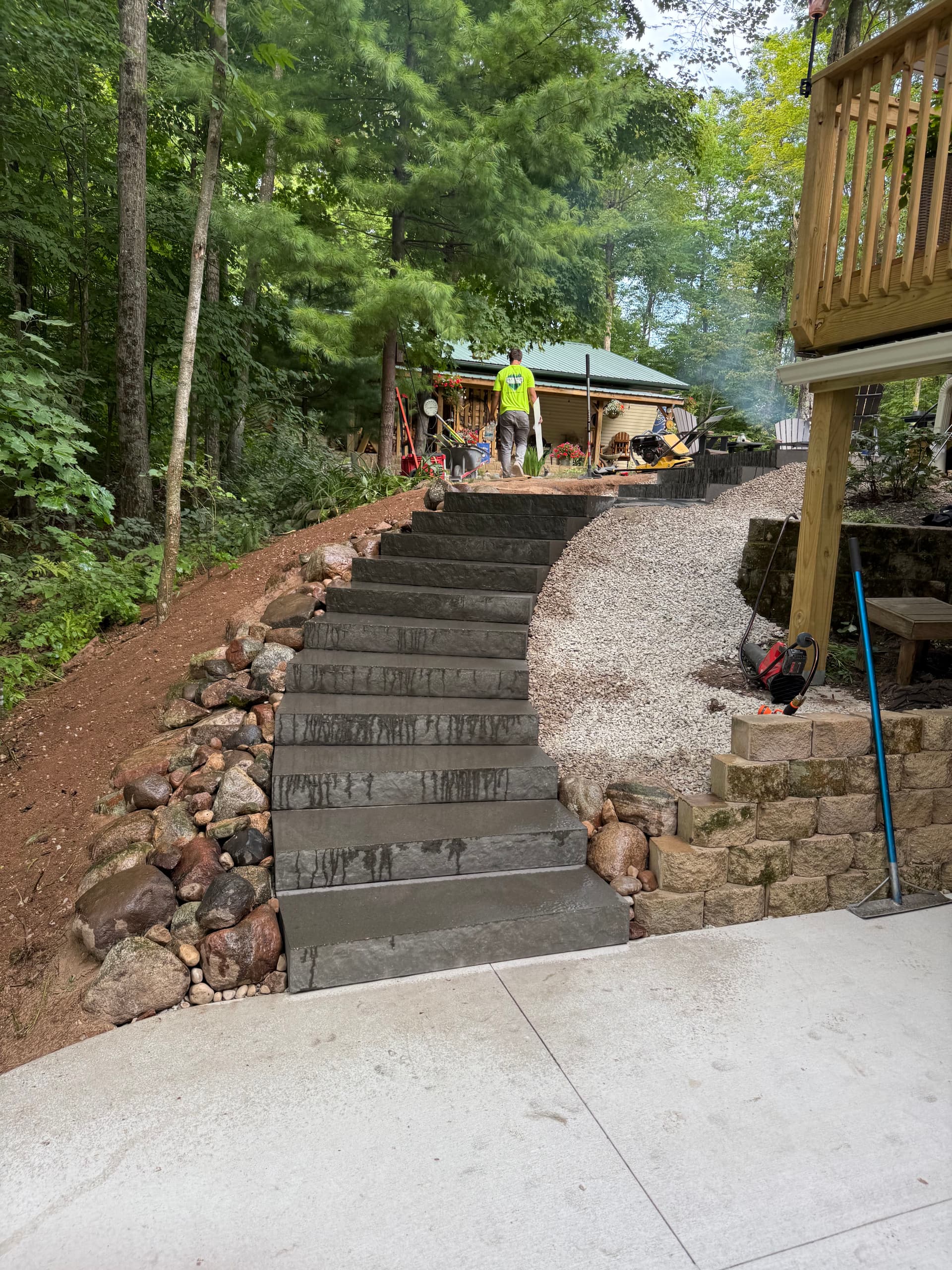 Gallery photos for Concrete Steps and Paver Landing Built Into a Wooded Lakeside Property: Image #2