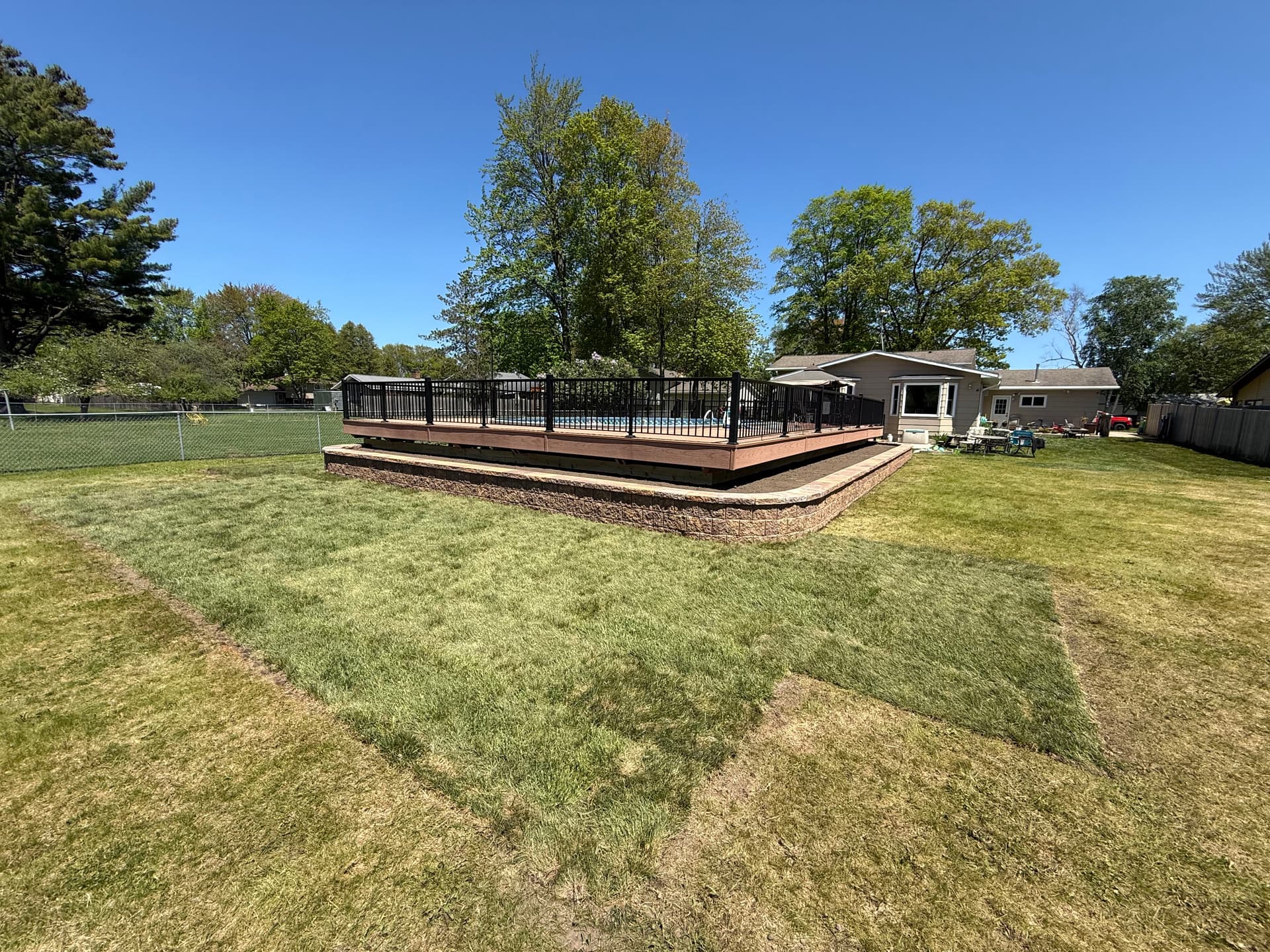 Gallery photos for 90-Foot Retaining Wall Frames This Backyard Pool Deck: Image #1