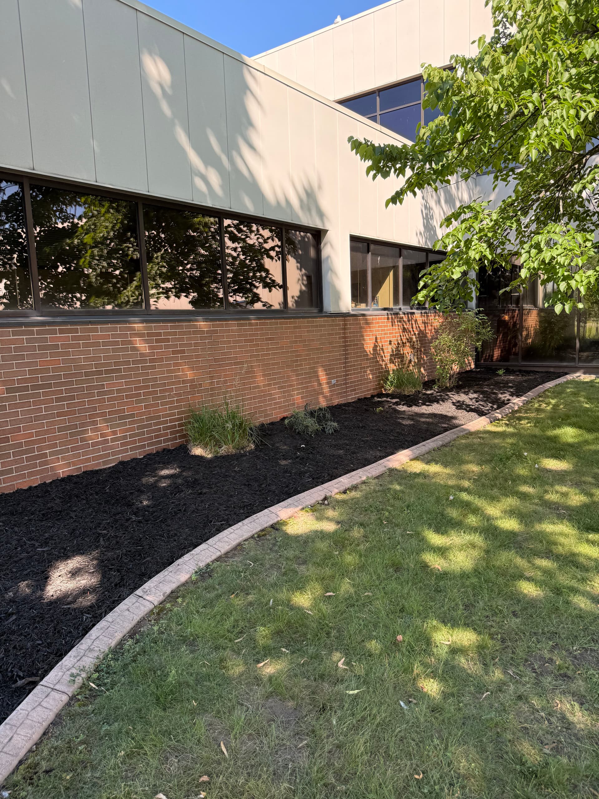 Gallery photos for Fresh Dark Mulch and Clean Beds at Fincantieri Marinette Marine: Image #2