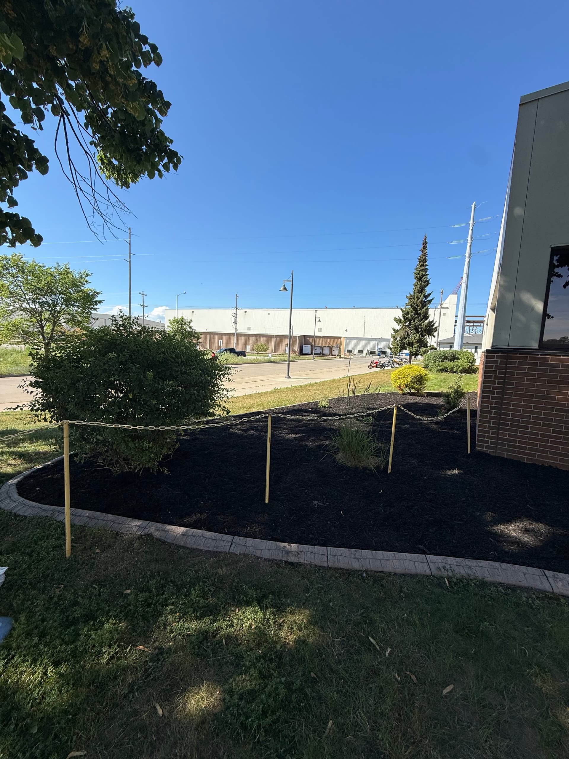 Gallery photos for Fresh Dark Mulch and Clean Beds at Fincantieri Marinette Marine: Image #3