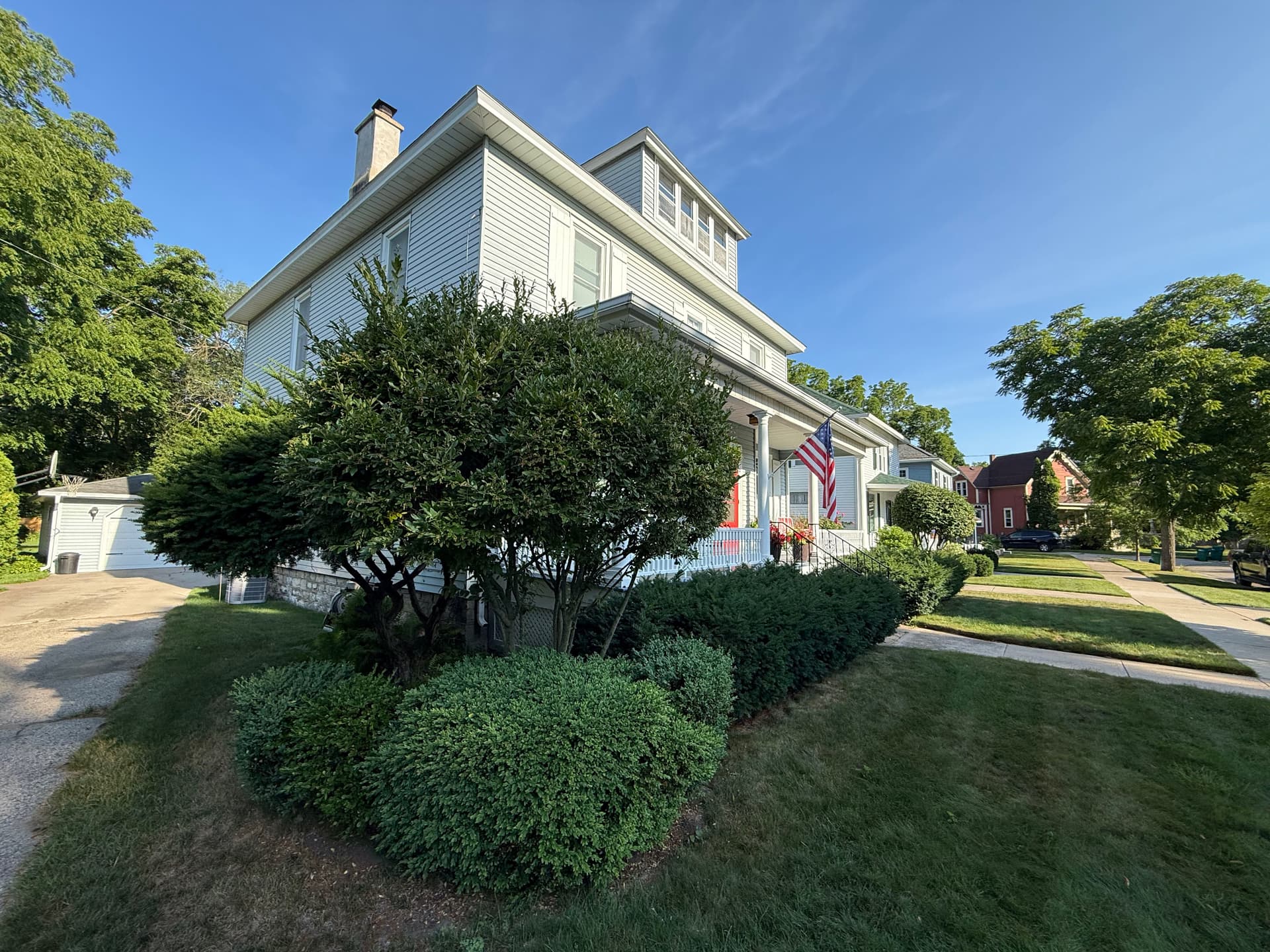 A Clean Shrub Trim Makes the Whole Front Yard Pop image